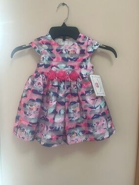 Marnellara Pink Floral Party Dress with Rosette Trim and capped sleeves. 18 mos.